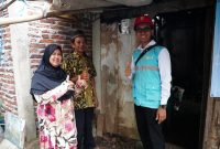 -SAMBUNG LISTRIK GRATIS- Senyum terpancar dari Suhartini, kini dia dan keluarganya mendapatkan akses listrik tanpa perlu menyalur lagi dari listrik tetangga setelah mendapatkan program sambung listrik gratis dari PLN. Foto : Dok.PLN/metrojateng.id