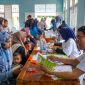 Warga antusias ikut kegiatan Volunteering yang digelar Nestlé Indonesia sebagai bagian dari Program Pendampingan Gizi yang digelar di Aula Kecamatan Bandar, Kabupaten Batang, Rabu (8/10/2025).